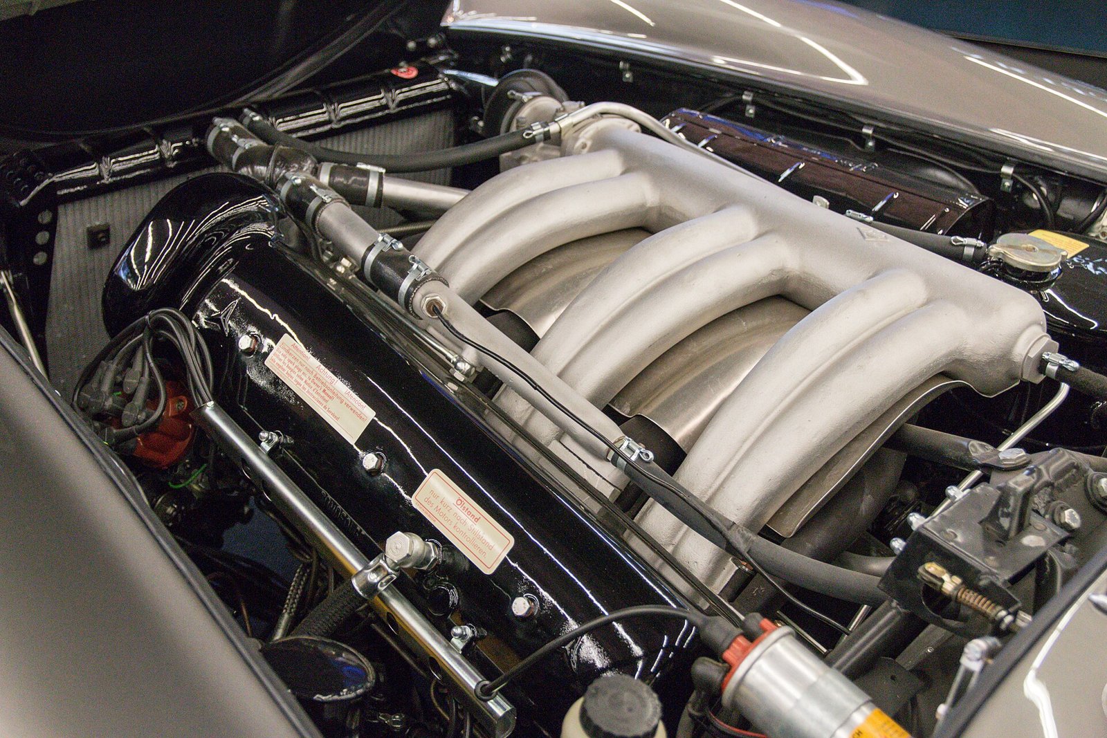 Mercedes-Benz M198 straight-six in a 300 SL, inclined to one side, with long intake runners