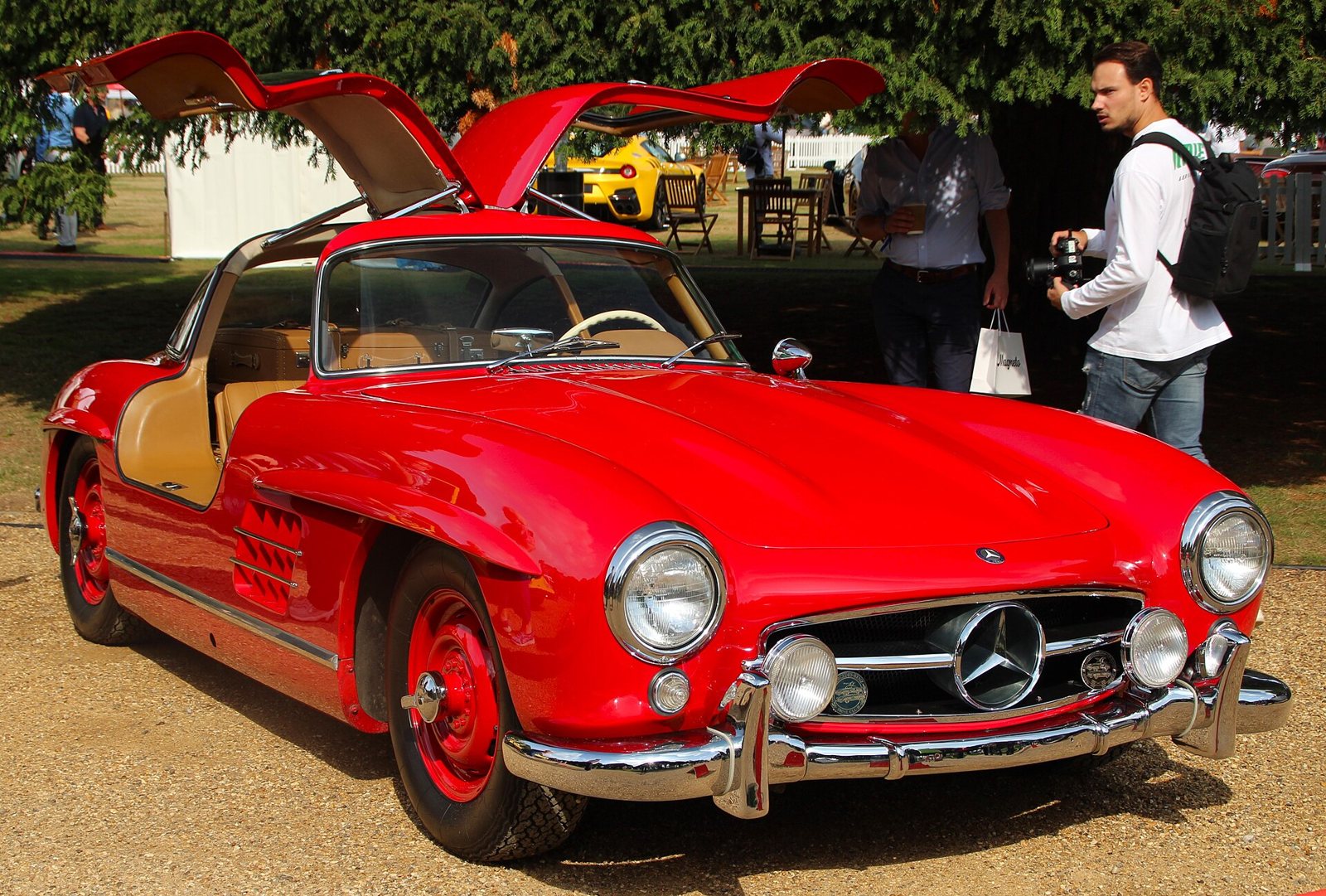 1955 Mercedes-Benz 300 SL Gullwing coupé in red with both gullwing doors open